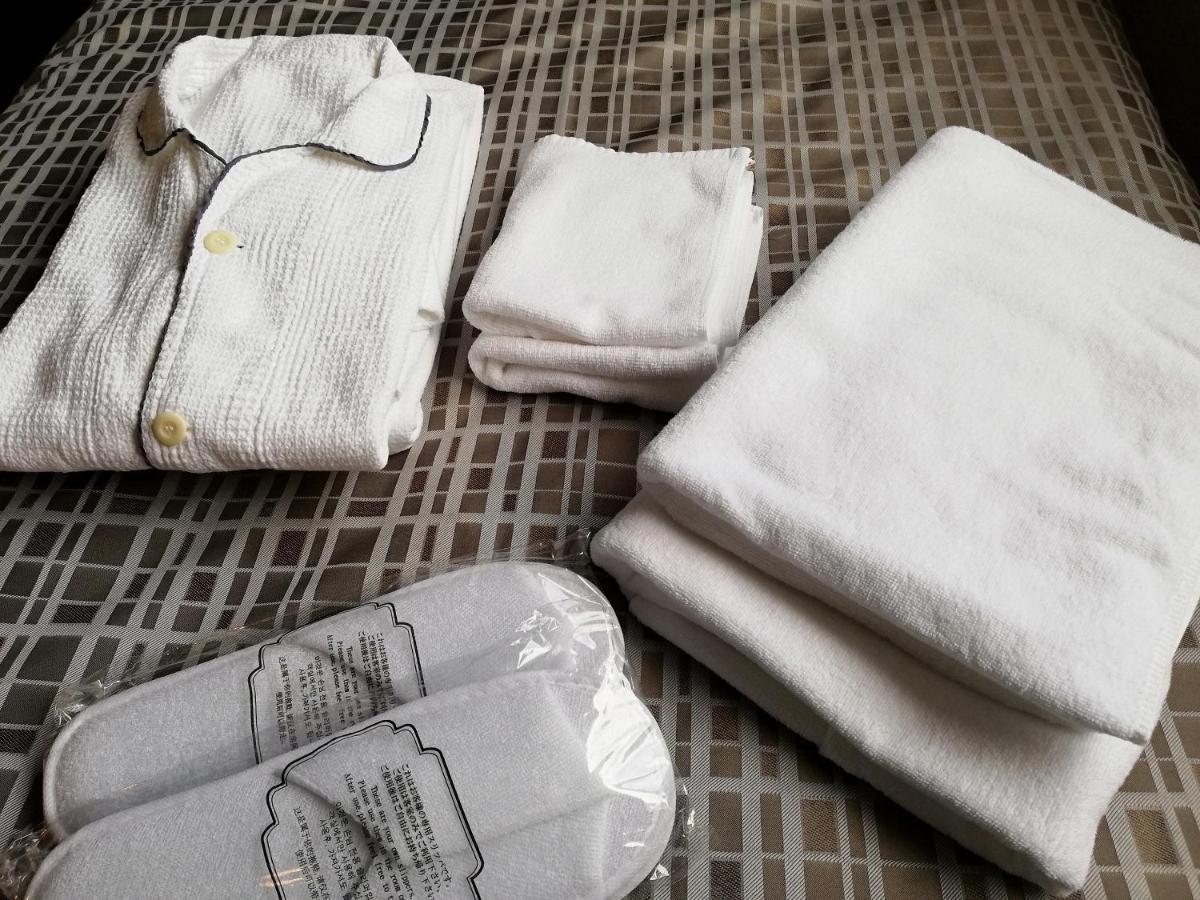 נאהא Hotel Maruki מראה חיצוני תמונה